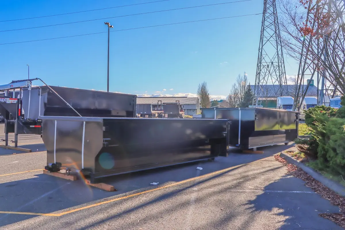 Roll-off dumpster ready for waste disposal at job site for Concrete Dumpster Rental in Chippewa